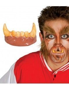 Dientes con colmillos de...